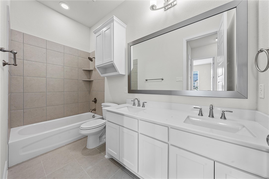 6402 Waggoner Court Temple, TX 76502 - Photo 21 of 30 a bathroom with a sink a toilet and shower