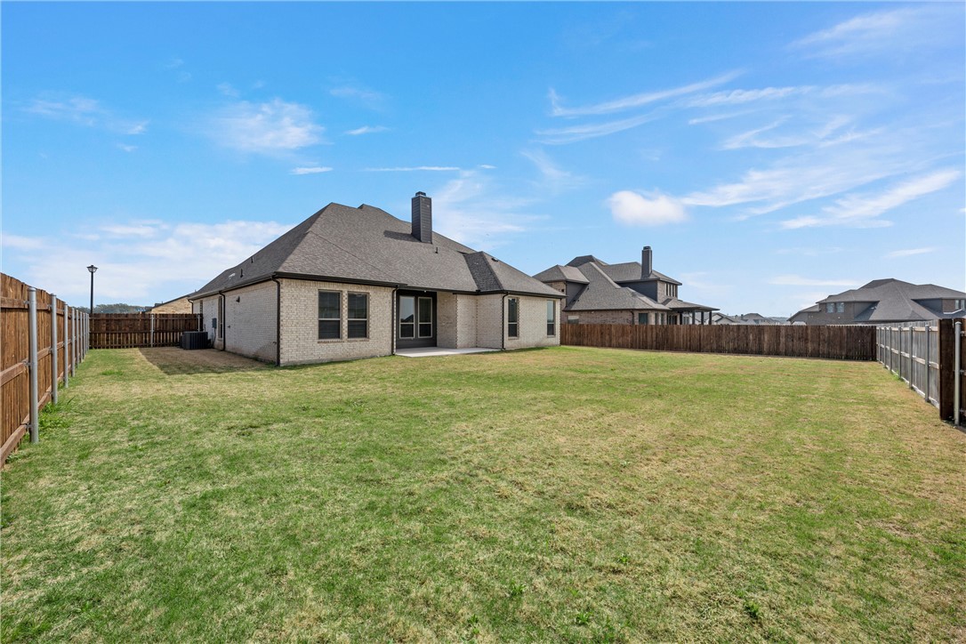 6402 Waggoner Court Temple, TX 76502 - Photo 29 of 30 a front view of a house with a garden