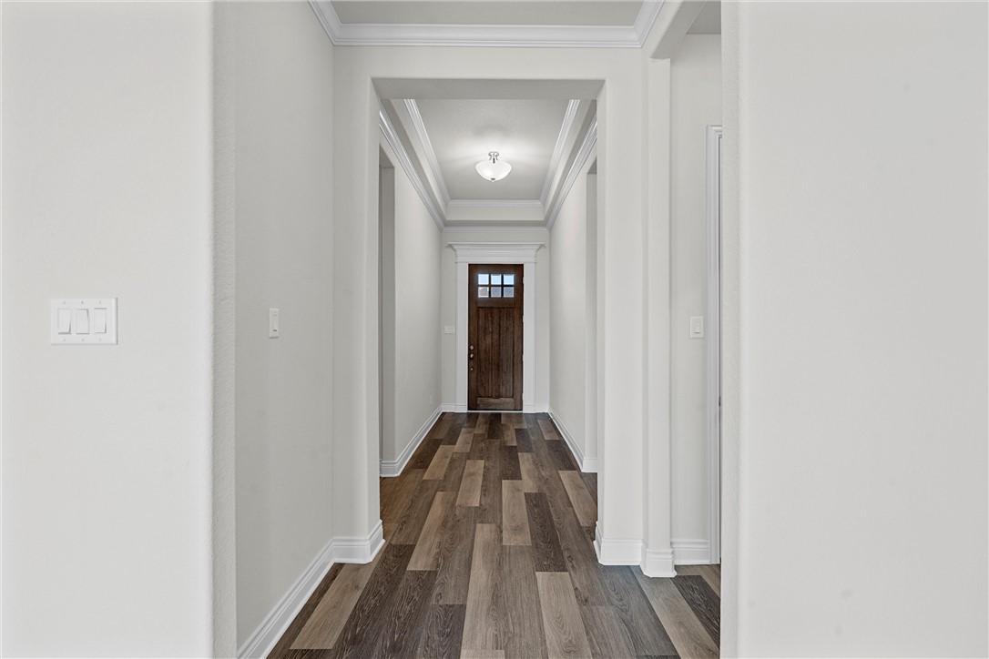 6402 Waggoner Court Temple, TX 76502 - Photo 3 of 30 a view of a hallway with wooden floor