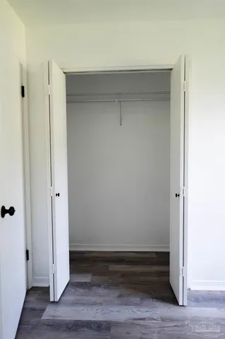 a view of room with walk in closet