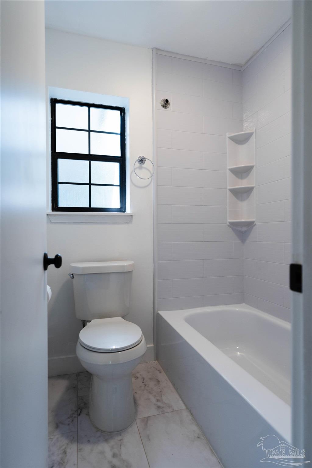 1156 Signal Hill Lane Pensacola, FL 32514 - Photo 8 of 16 a bathroom with a toilet and a bathtub