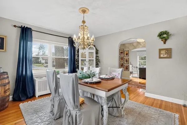 a view of a dining room with furniture window and outside view
