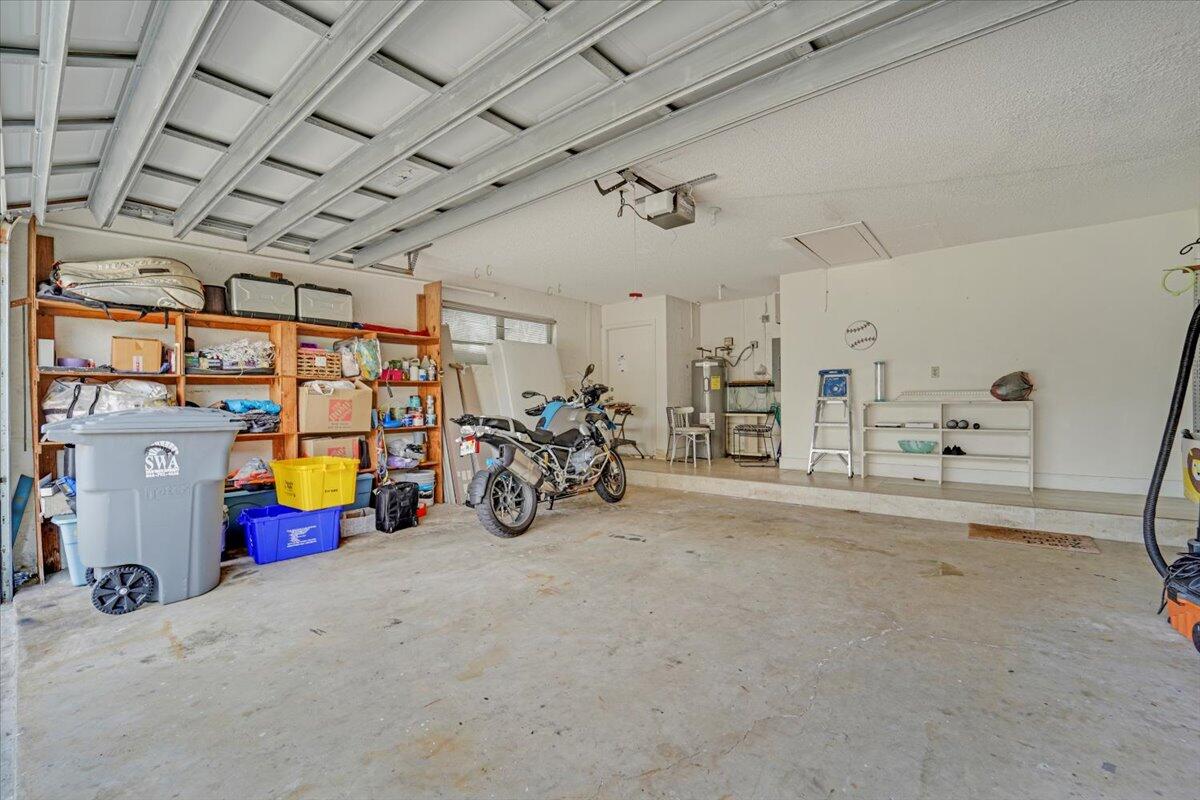 21575 Kapok Circle Boca Raton, FL 33433 - Photo 3 of 27 a view of a garage with furniture