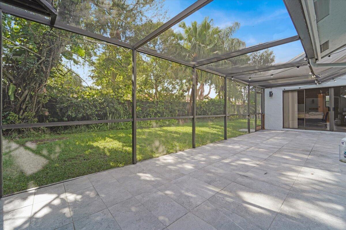 21575 Kapok Circle Boca Raton, FL 33433 - Photo 7 of 27 a view of swimming pool with a yard