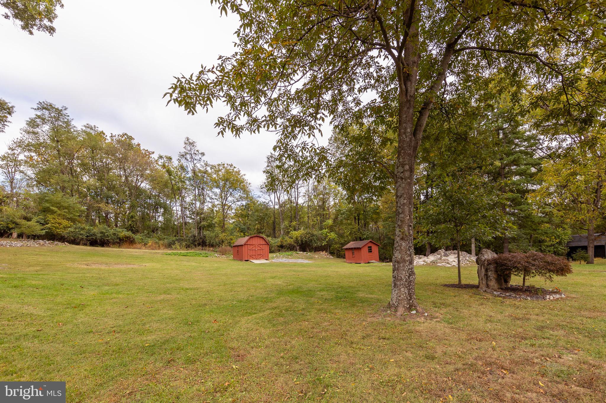 411 Rest Church Road Winchester, VA 22603 - Photo 46 of 46 Serene landscape with charming red outbuildings.
