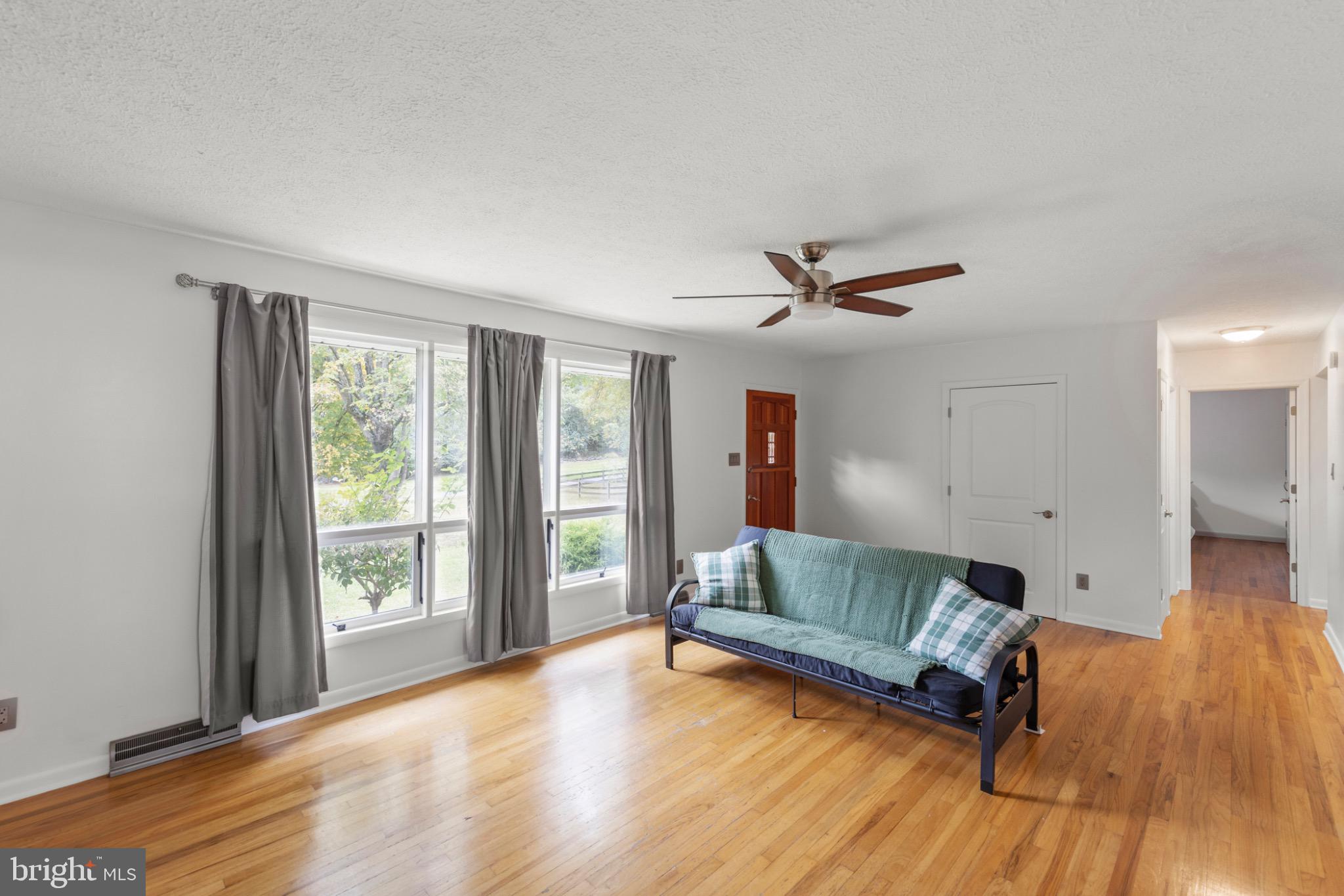 411 Rest Church Road Winchester, VA 22603 - Photo 8 of 46 Bright and airy living space with natural light.