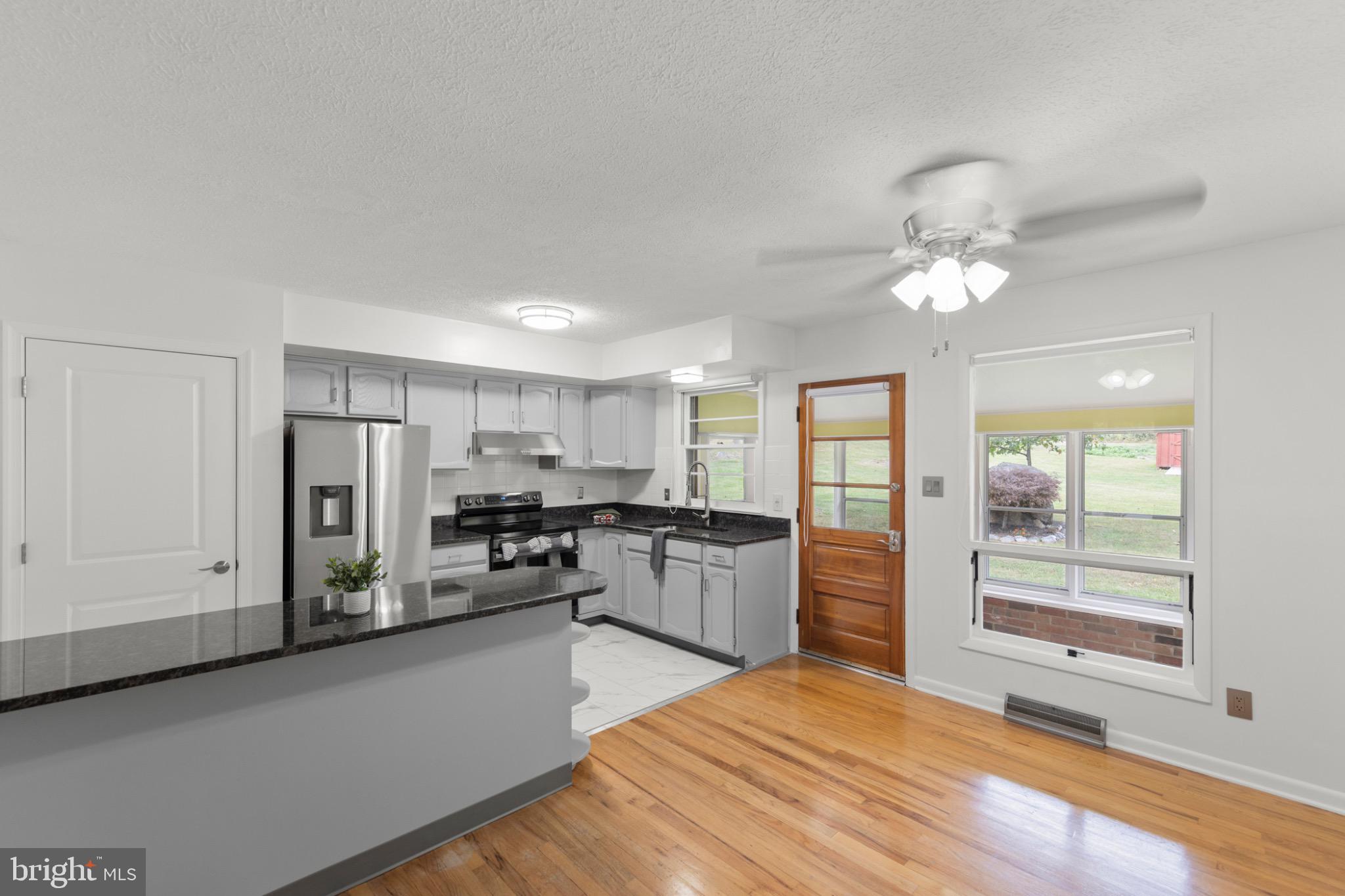 411 Rest Church Road Winchester, VA 22603 - Photo 10 of 46 Modern kitchen with sleek finishes.