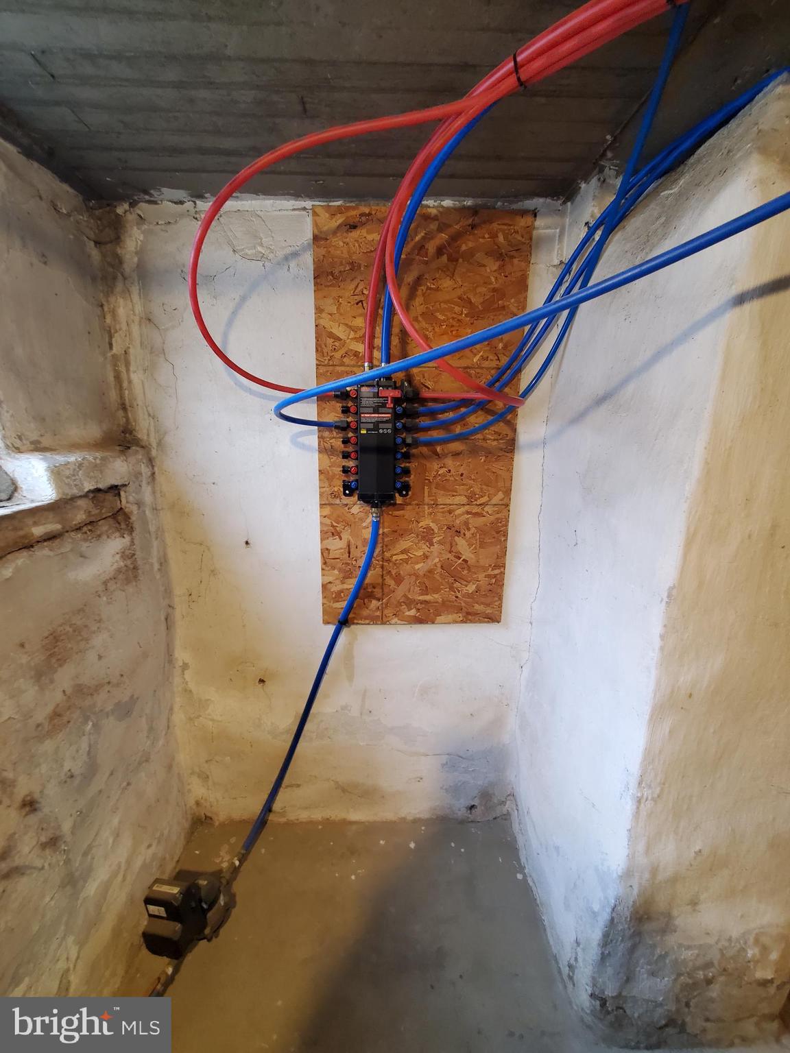 2130 Anchor Street Philadelphia, PA 19124 - Photo 16 of 23 a picture of a room with wooden floor and white walls