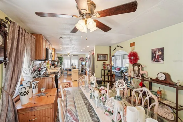 a view of a room with lots of wooden furniture