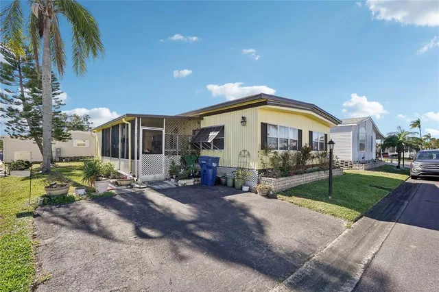 a view of house with outdoor entertaining spaces