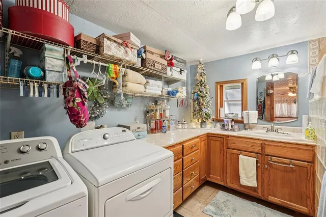 a utility room with lot of cabinet and shower