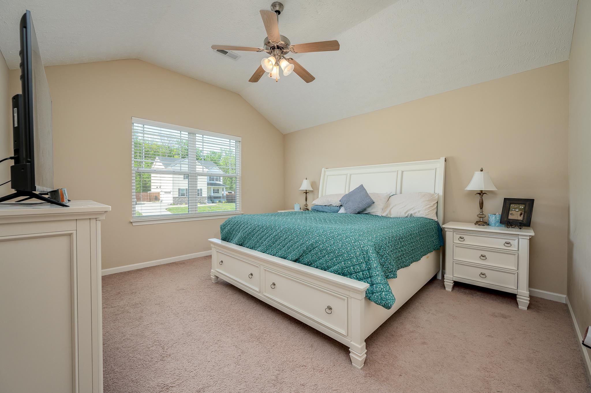 1145 Starhurst Drive Murfreesboro, TN 37128 - Photo 11 of 27 a spacious bedroom with a bed and a chandelier