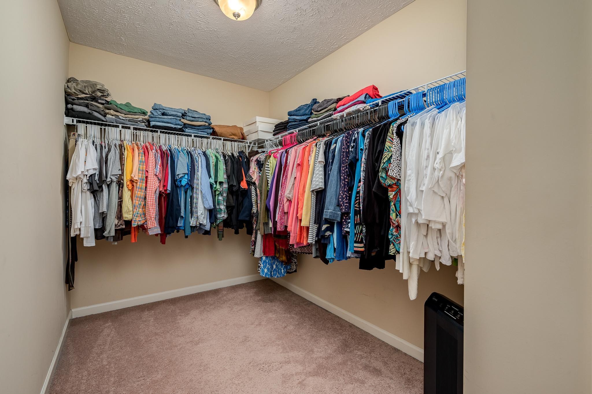 1145 Starhurst Drive Murfreesboro, TN 37128 - Photo 12 of 27 a view of walk in closet with clothes and shoes