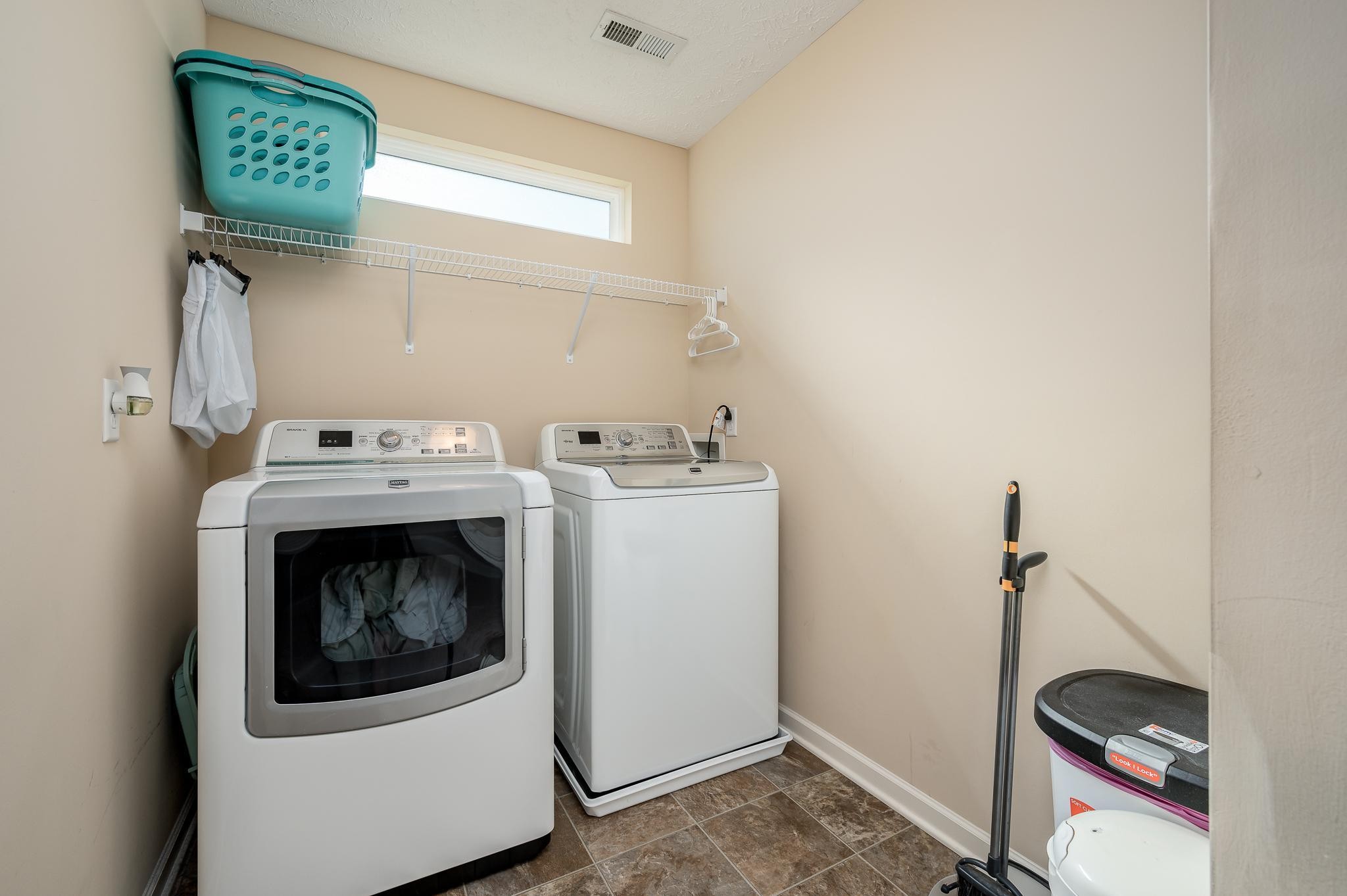 1145 Starhurst Drive Murfreesboro, TN 37128 - Photo 15 of 27 a utility room with dryer and washer