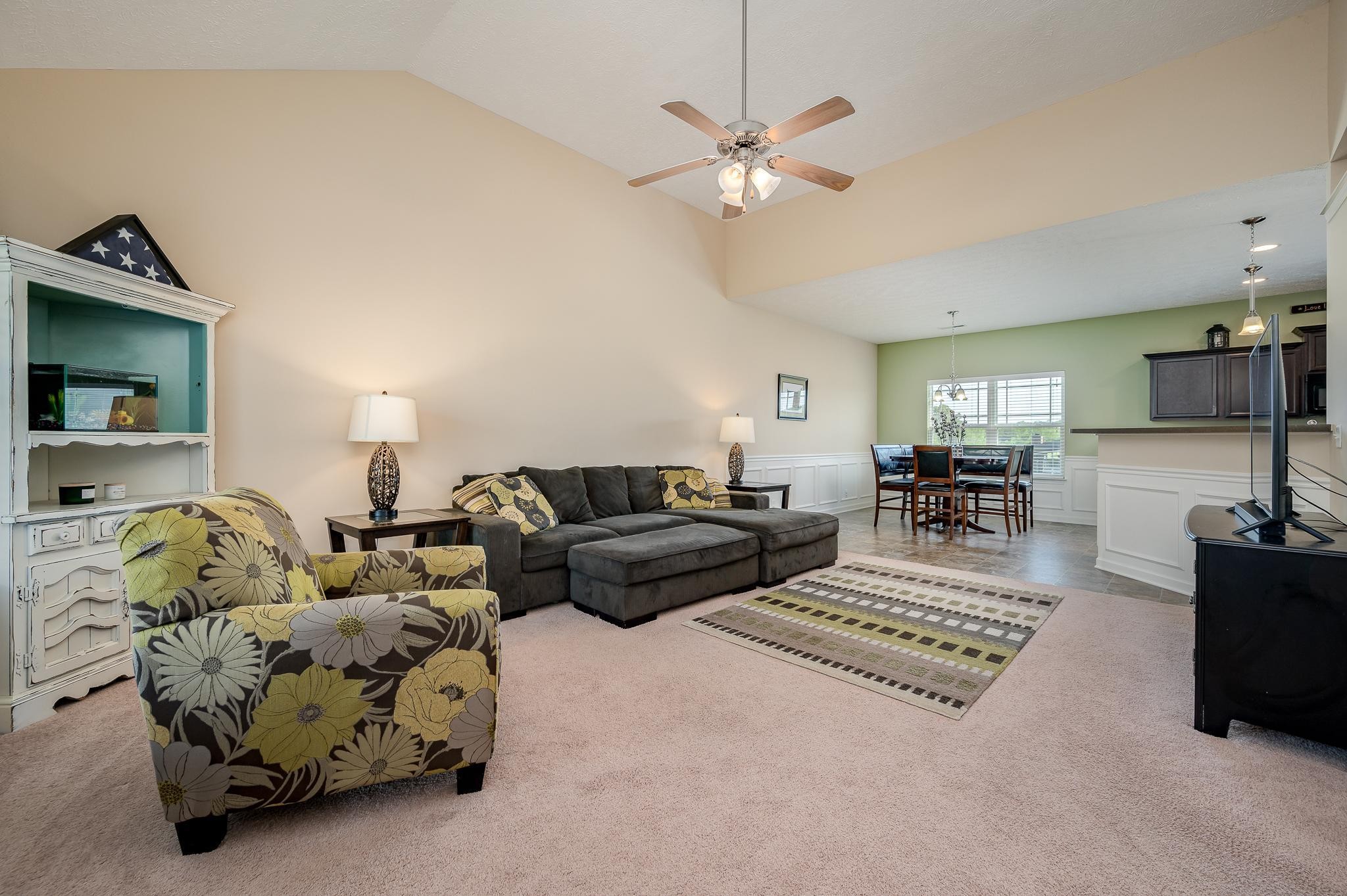 1145 Starhurst Drive Murfreesboro, TN 37128 - Photo 2 of 27 a living room with furniture and a chandelier