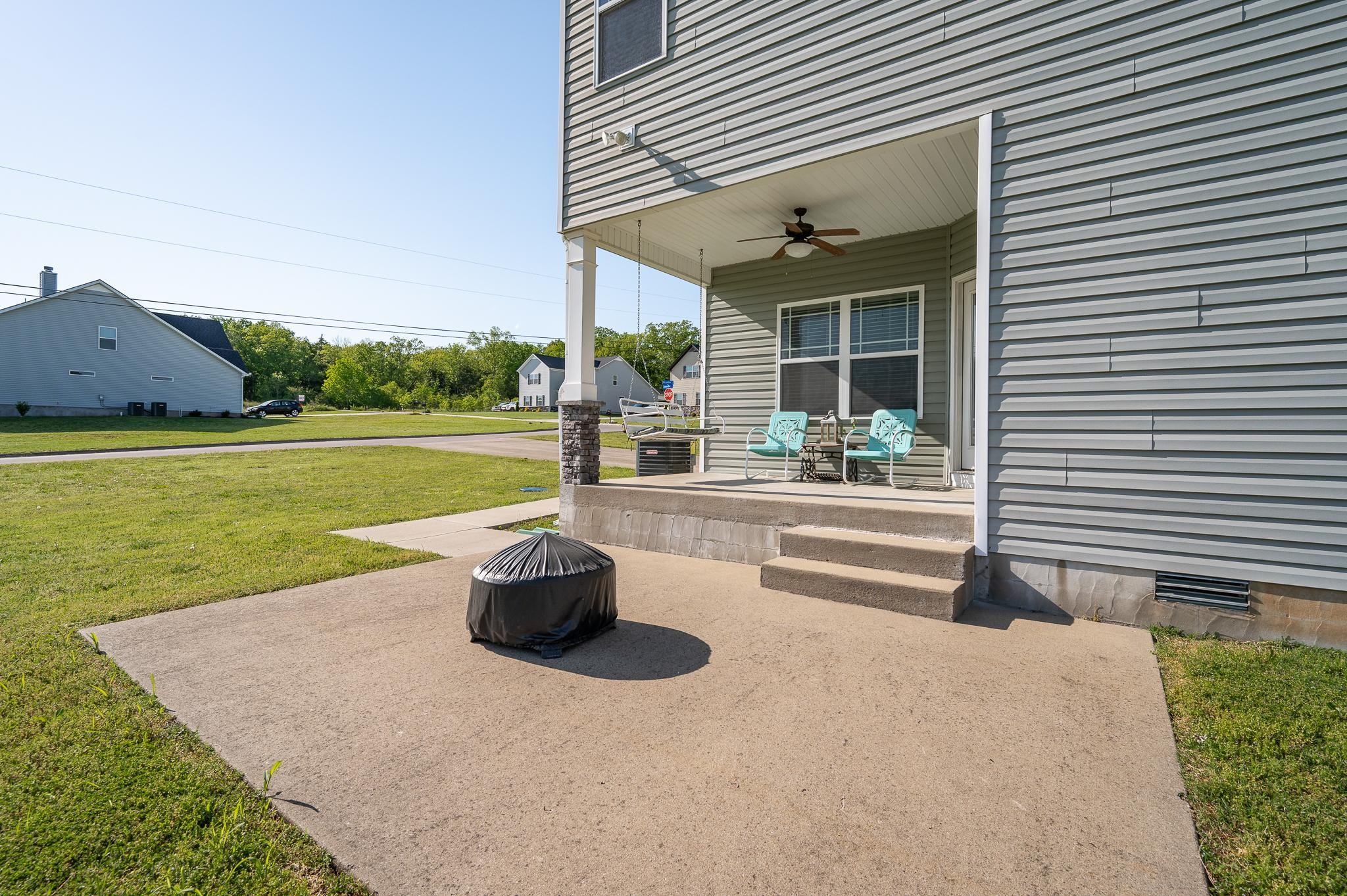 1145 Starhurst Drive Murfreesboro, TN 37128 - Photo 21 of 27 a view of a house with a yard and a porch