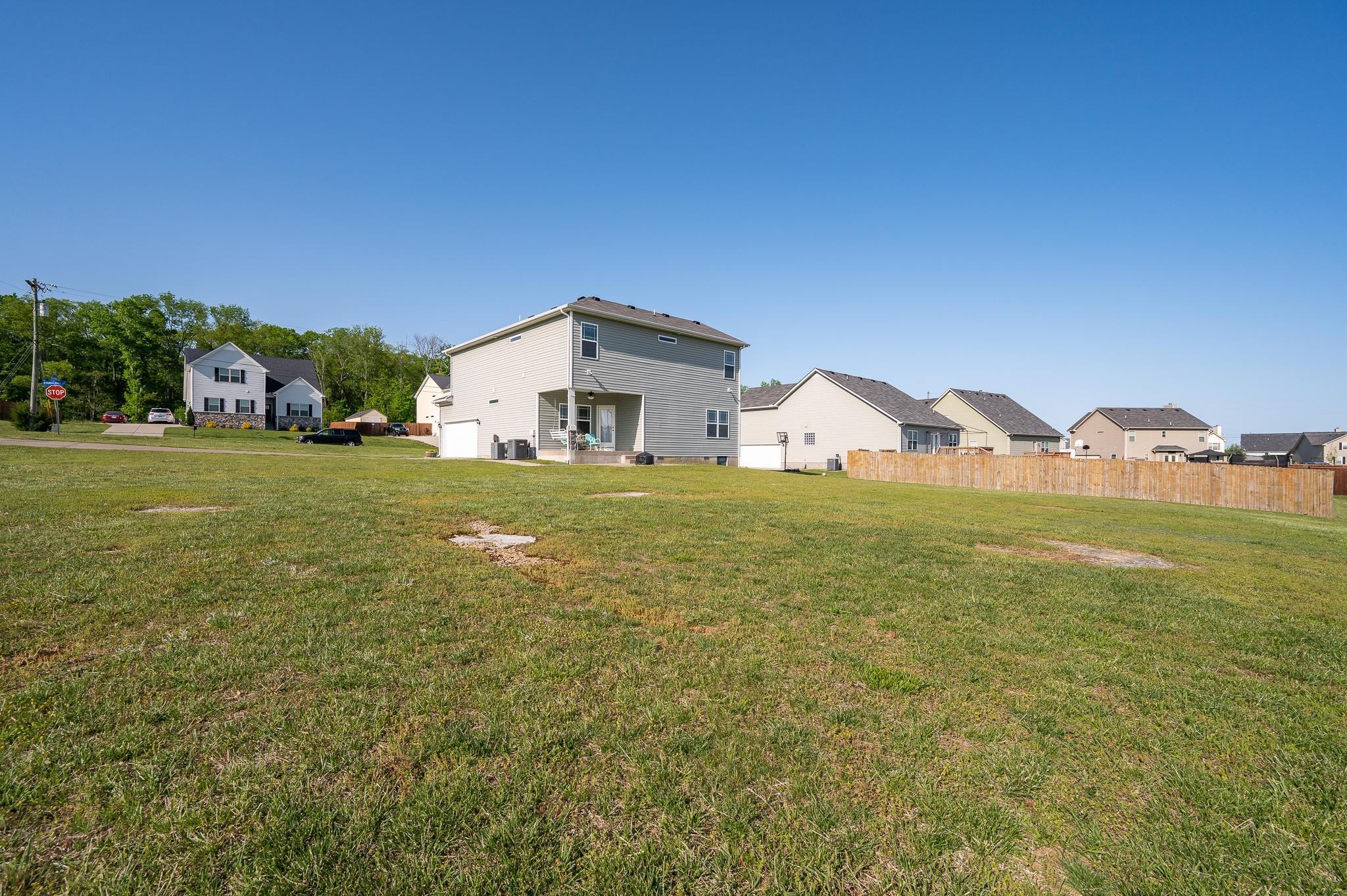 1145 Starhurst Drive Murfreesboro, TN 37128 - Photo 22 of 27 a view of a house with a big yard