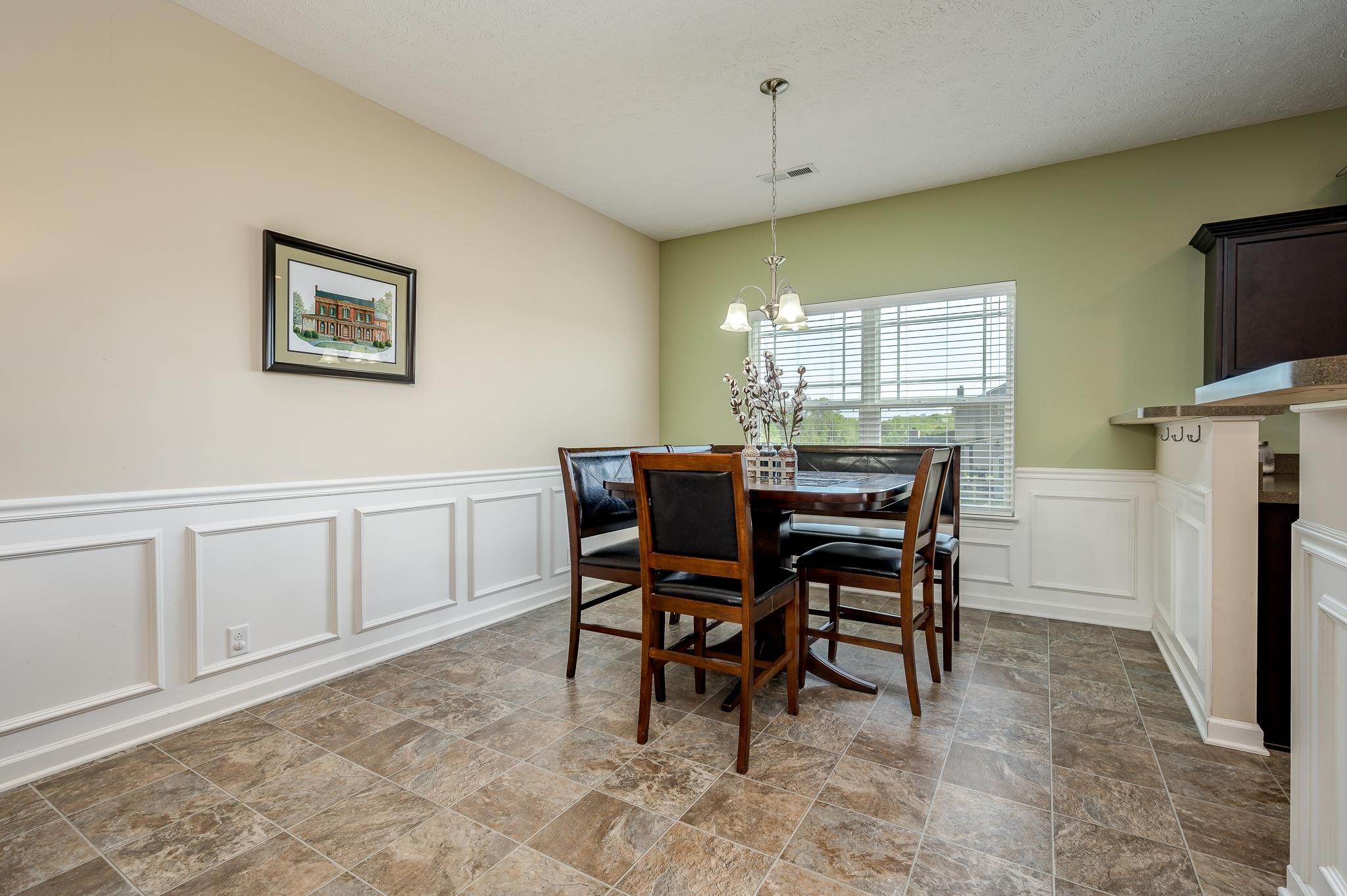 1145 Starhurst Drive Murfreesboro, TN 37128 - Photo 8 of 27 a view of a dining room with furniture