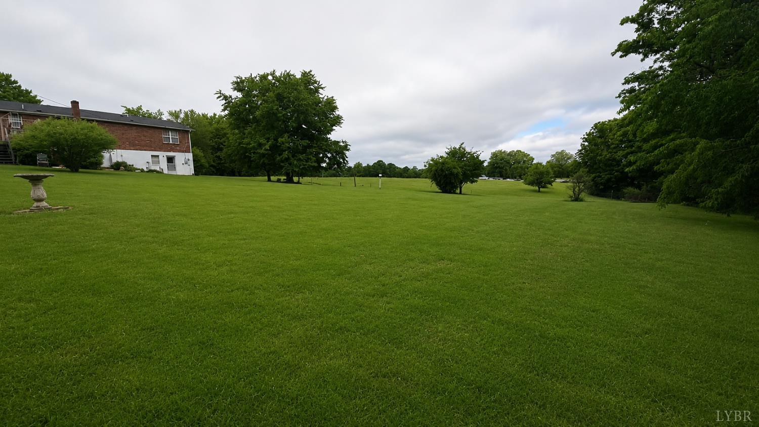 2346 Mitchell Mill Road Gladys, VA 24554 - Photo 24 of 38 a view of a house with a big yard