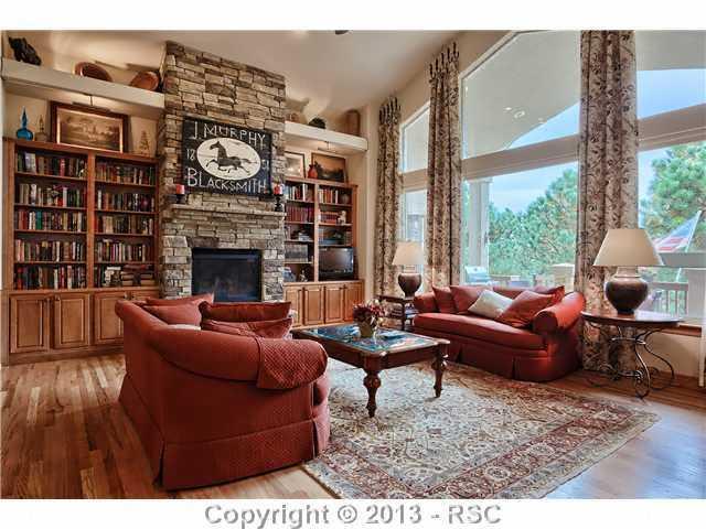 11587 Shaugnessy Road Colorado Springs, CO 80908 - Photo 6 of 24 Vaulted great room with wall of windows