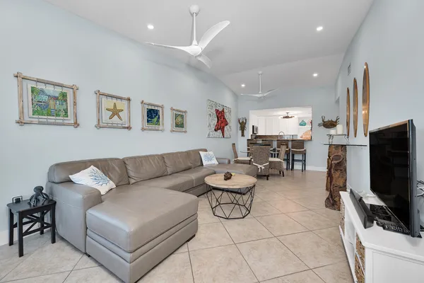 a balcony with dining table & chairs