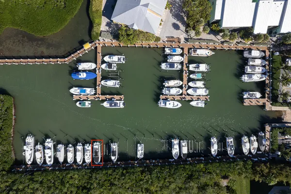 a table with wine bottles and glasses on it