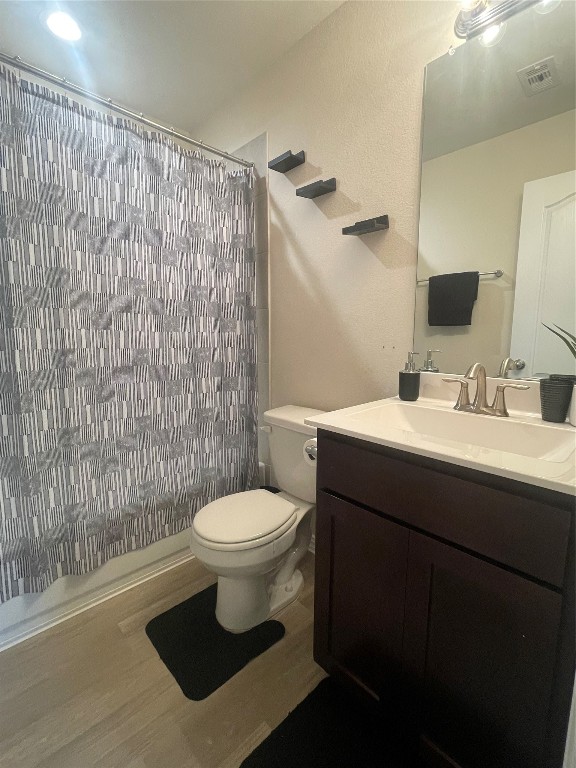 17768 Lion Heart Road Conroe, TX 77306 - Photo 5 of 11 a bathroom with a sink toilet and shower