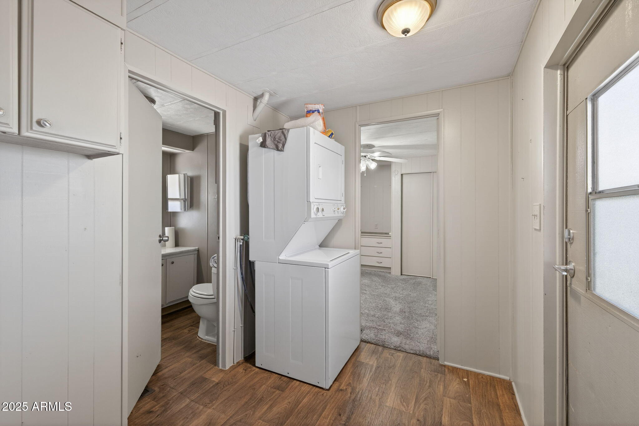 201 South Greenfield Road, Unit 310 Mesa, AZ 85206 - Photo 21 of 34 a bathroom with a sink and a mirror