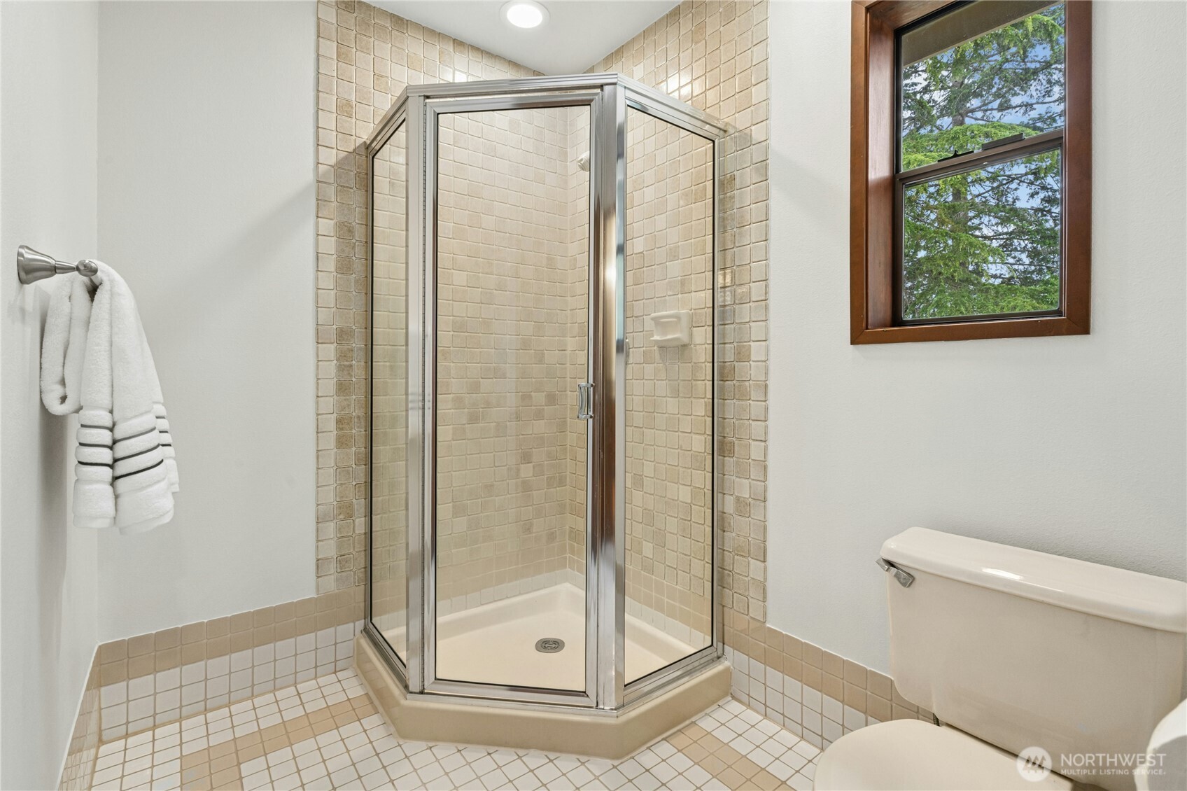 5211 103rd Street Southwest, Unit SW Mukilteo, WA 98275 - Photo 22 of 40 a bathroom with a shower and toilet