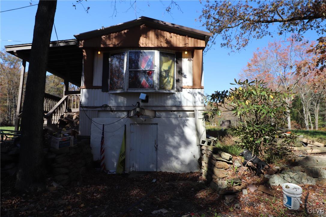8427 Rextown Road Slatington, PA 18080 - Photo 4 of 13 a view of a house with a yard
