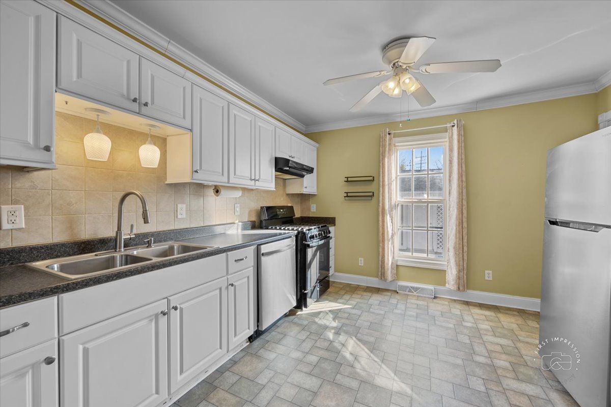 5N638 Hanson Road St. Charles, IL 60175 - Photo 12 of 31 a kitchen with a sink cabinets and stainless steel appliances