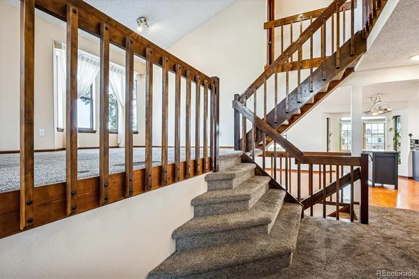 a view of an entryway with staircase