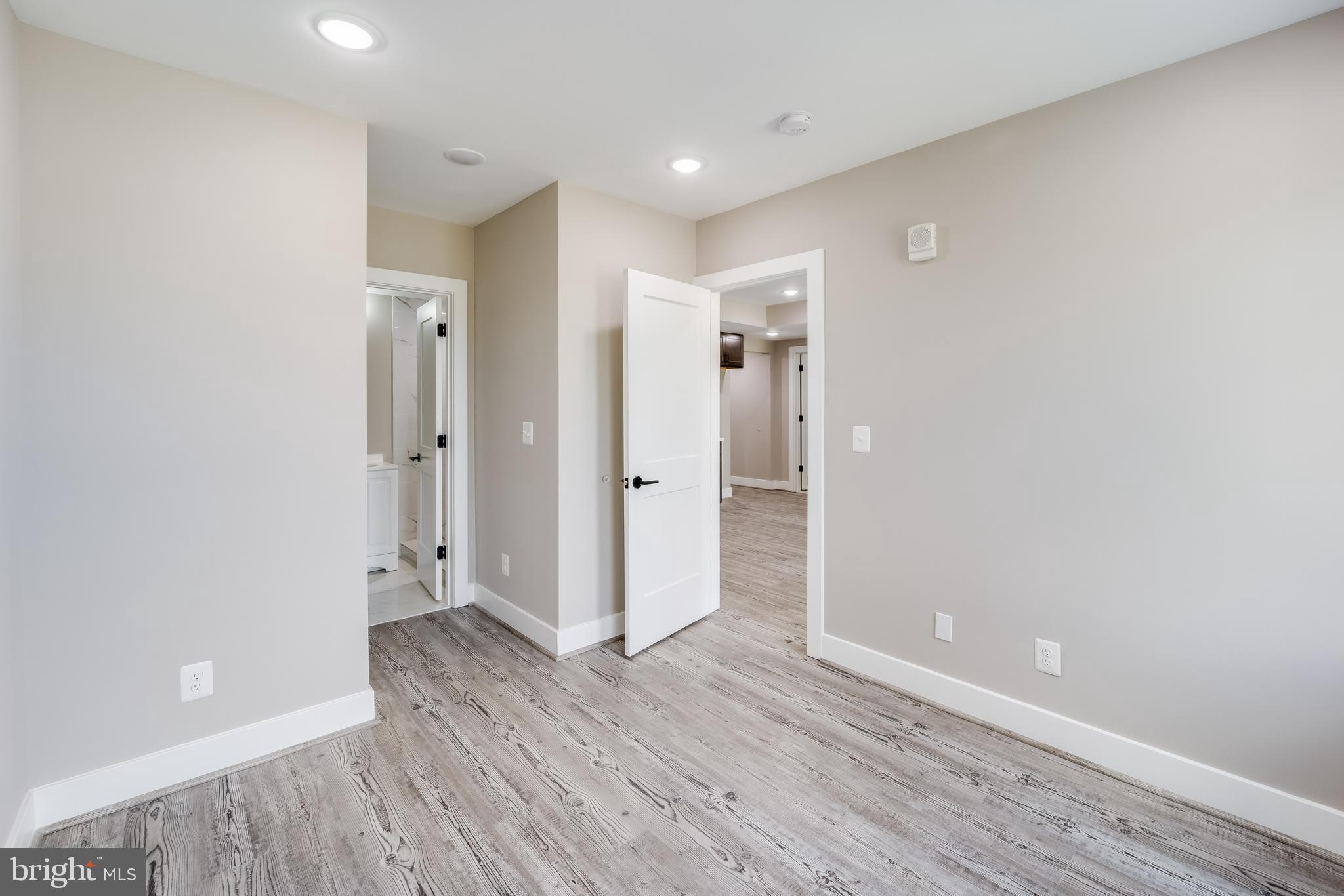 1617 Rhode Island Avenue Northeast, Unit 501 Washington, DC 20018 - Photo 9 of 17 a view of hallway with wooden floor