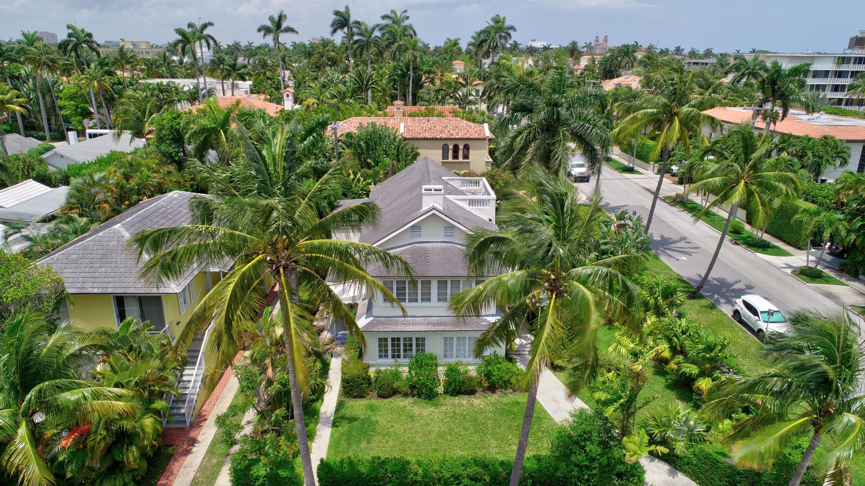 301 Chilean Avenue, Unit 80 Palm Beach, FL 33480 - Photo 1 of 20 an aerial view of a house with a yard and plants