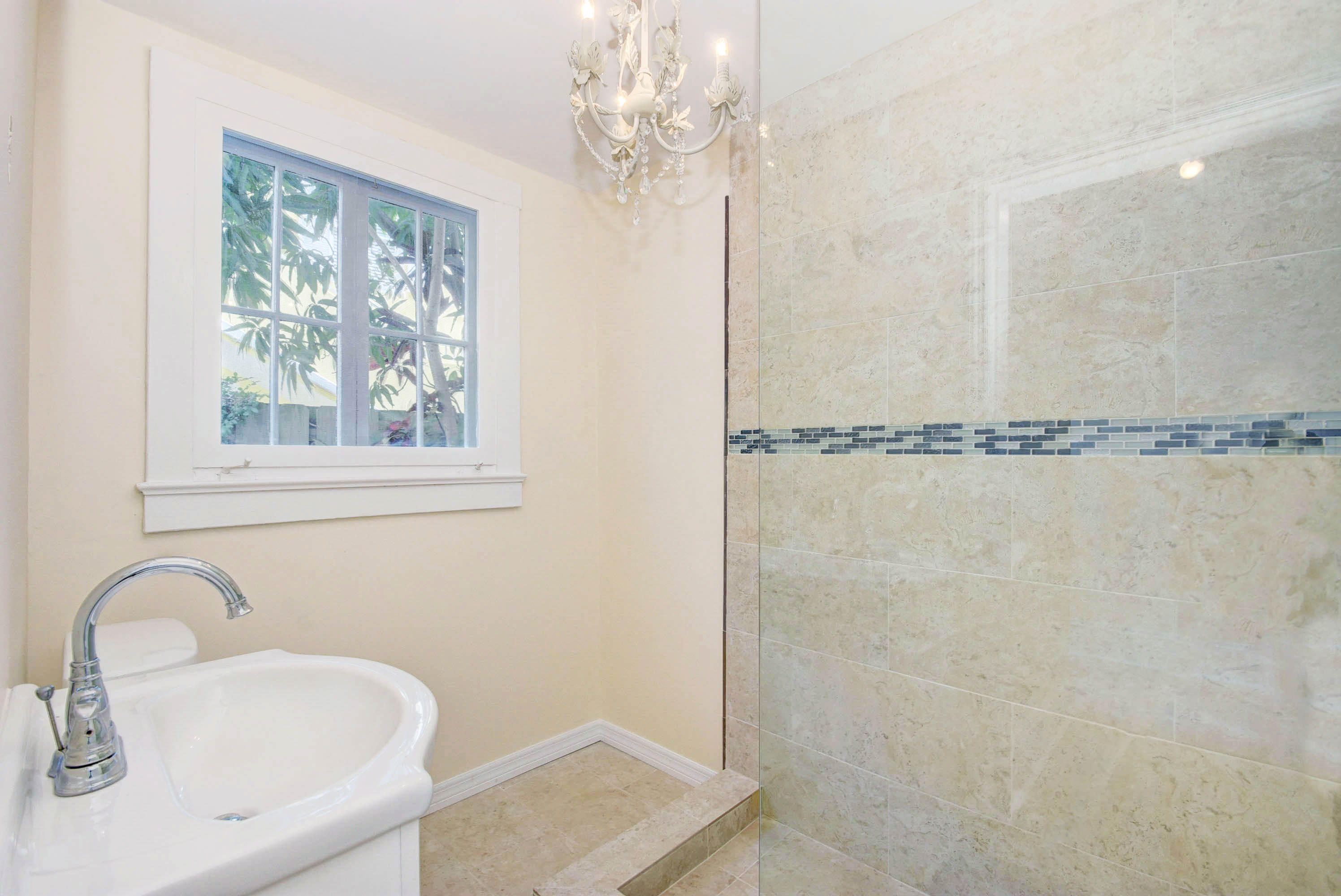 301 Chilean Avenue, Unit 80 Palm Beach, FL 33480 - Photo 14 of 20 a bathroom with a sink a vanity and a mirror