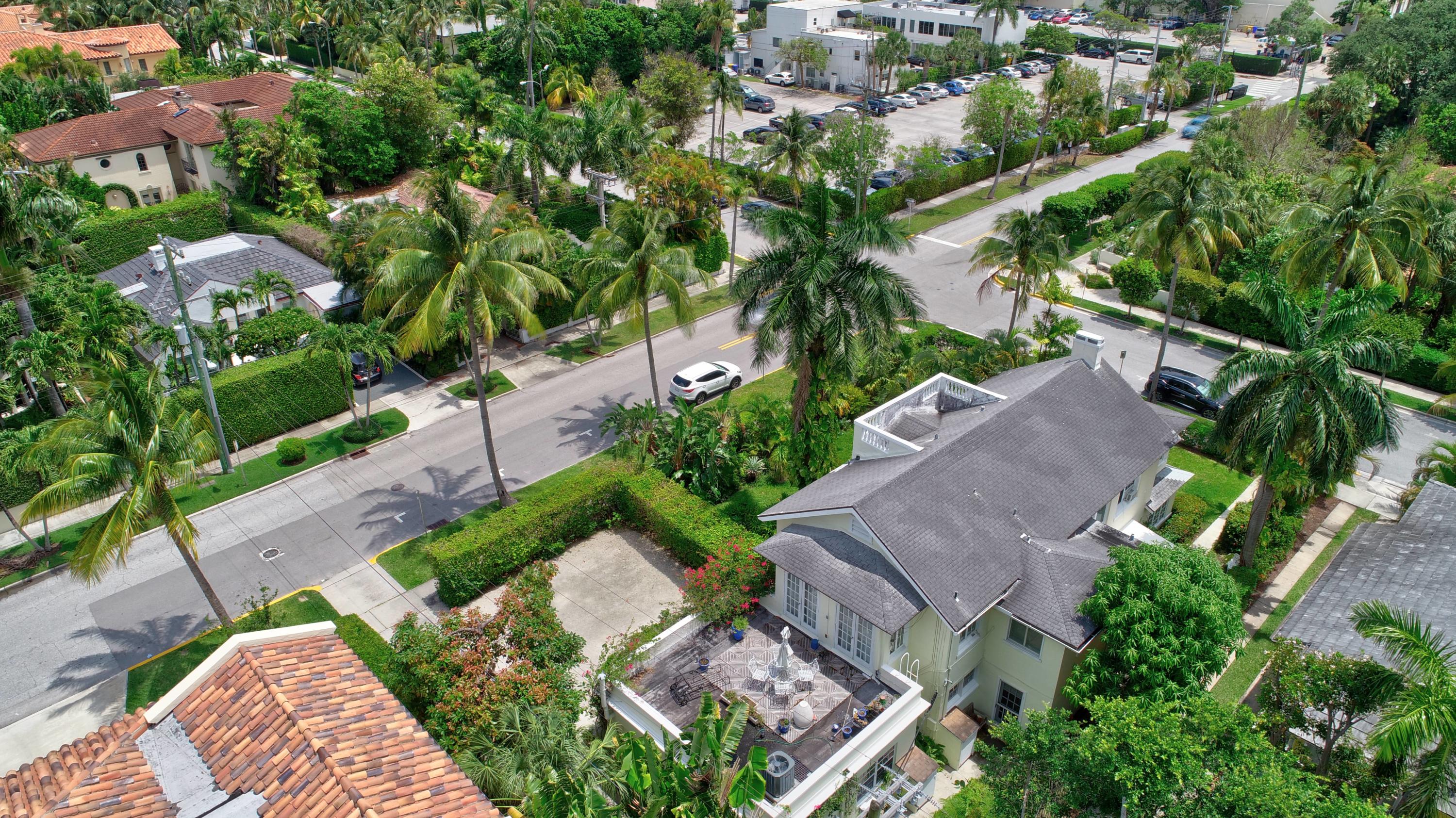 301 Chilean Avenue, Unit 80 Palm Beach, FL 33480 - Photo 20 of 20 an aerial view of a house with a yard and garden