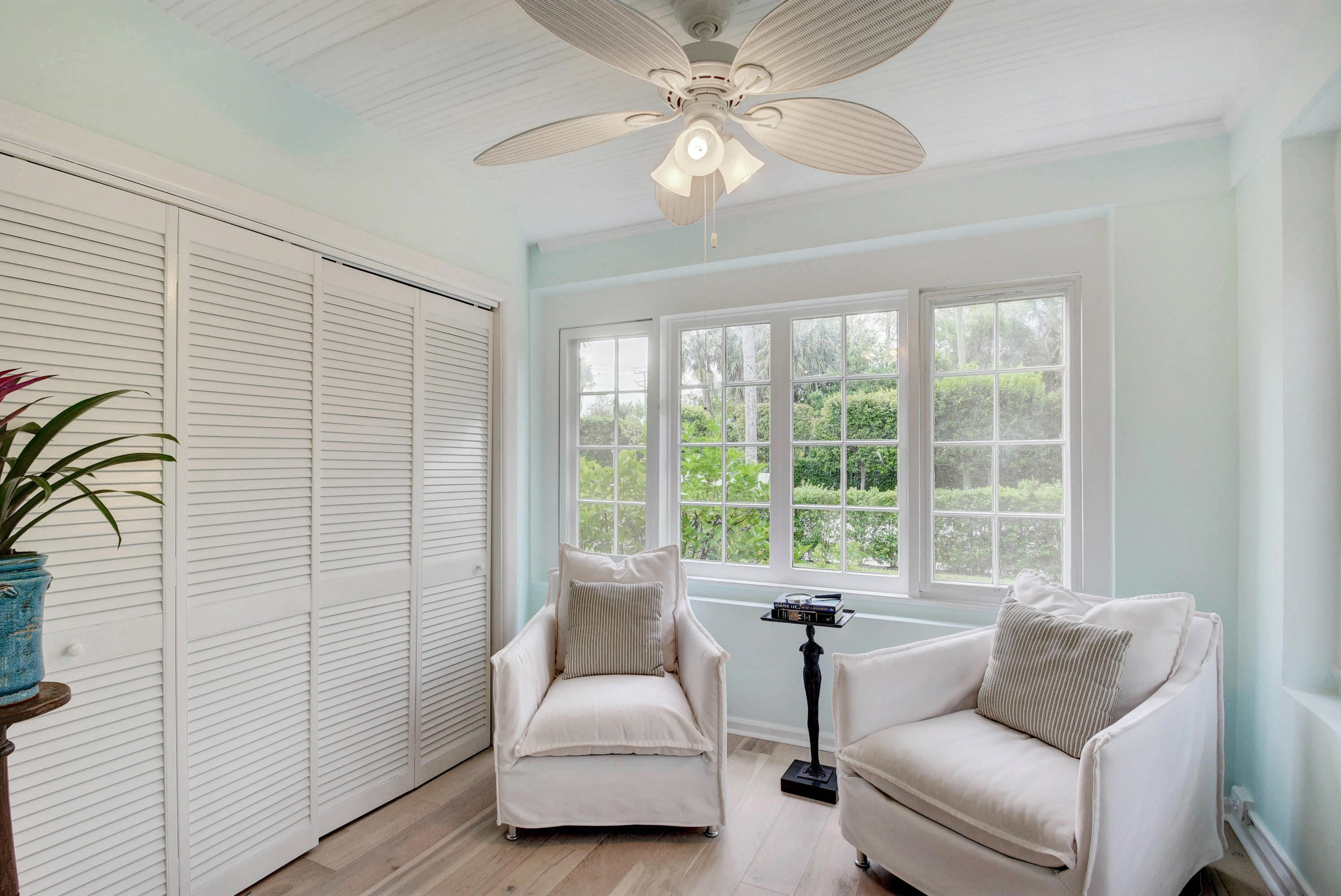 301 Chilean Avenue, Unit 80 Palm Beach, FL 33480 - Photo 10 of 20 a living room with furniture and a large window