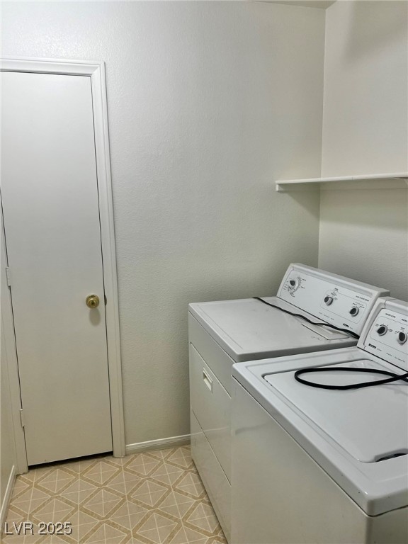 3153 Amari Avenue Las Vegas, NV 89141 - Photo 16 of 21 Laundry area featuring washer and clothes dryer