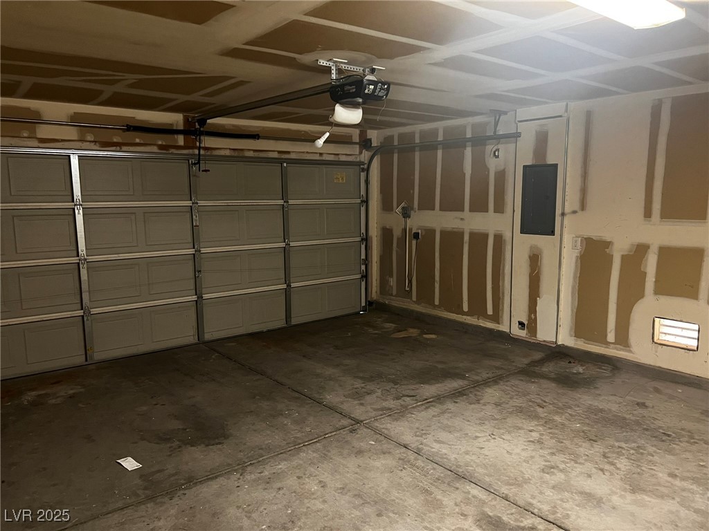 3153 Amari Avenue Las Vegas, NV 89141 - Photo 21 of 21 Garage with electric panel and a garage door opener