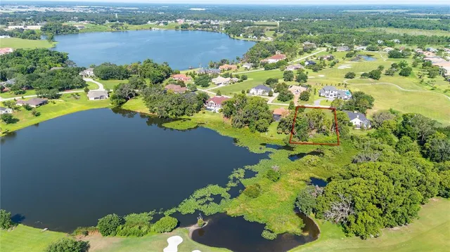 a view of a lake with a yard