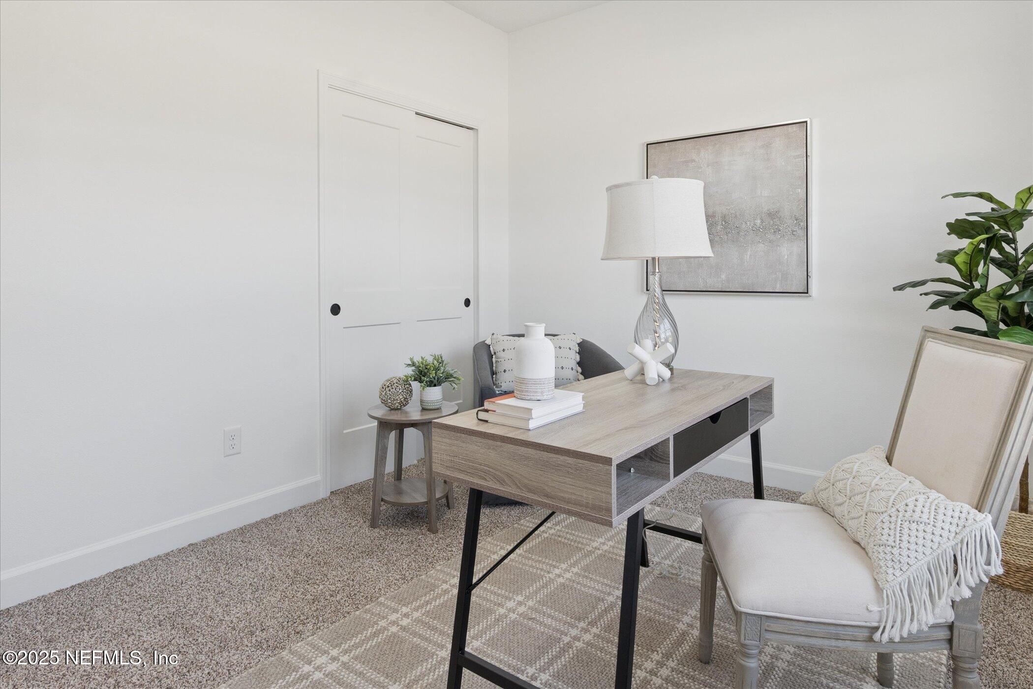 9293 Dolphin Street Sanderson, FL 32087 - Photo 13 of 29 a view of a workspace with furniture