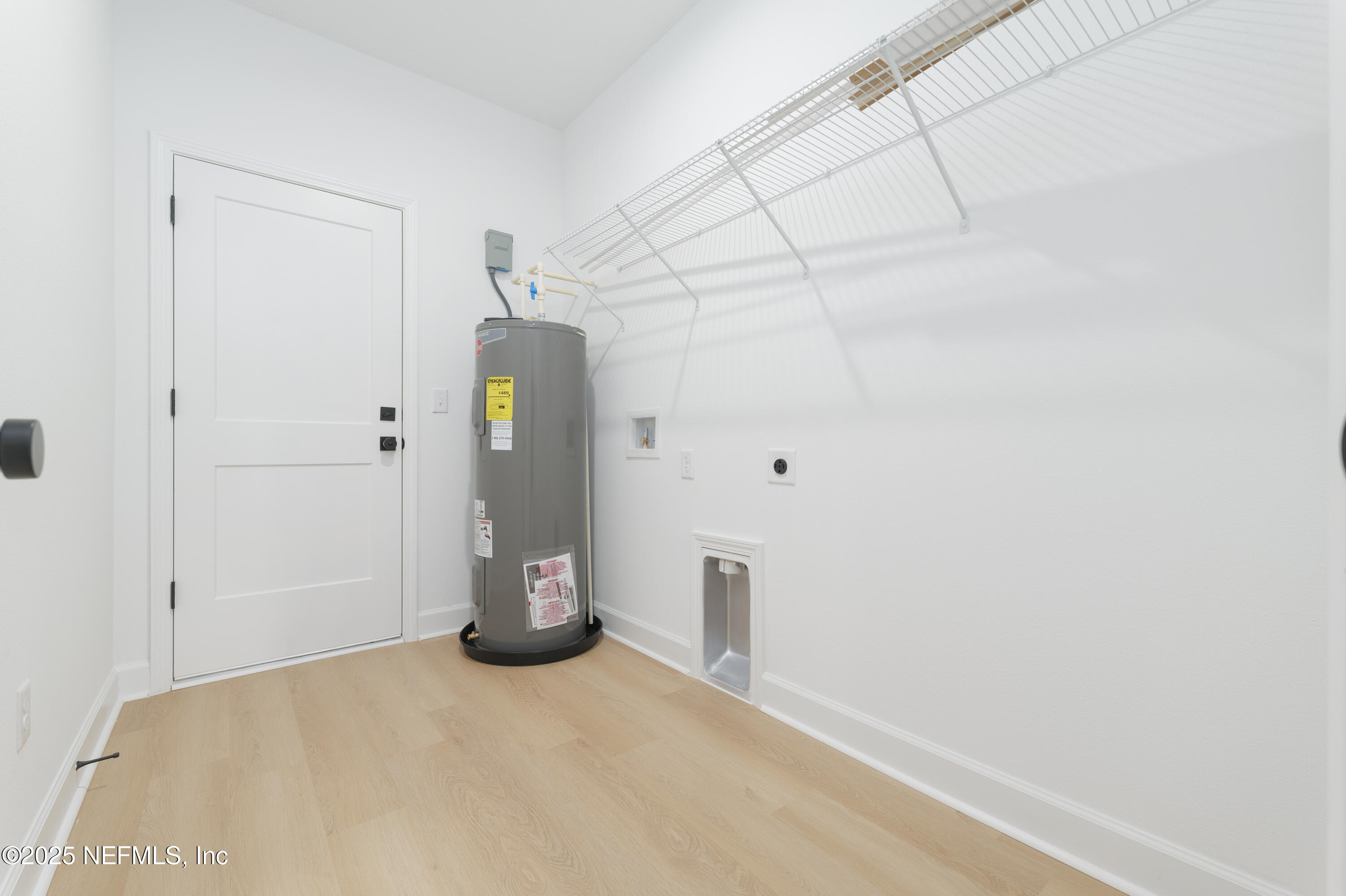 9293 Dolphin Street Sanderson, FL 32087 - Photo 25 of 29 a view of water heater room