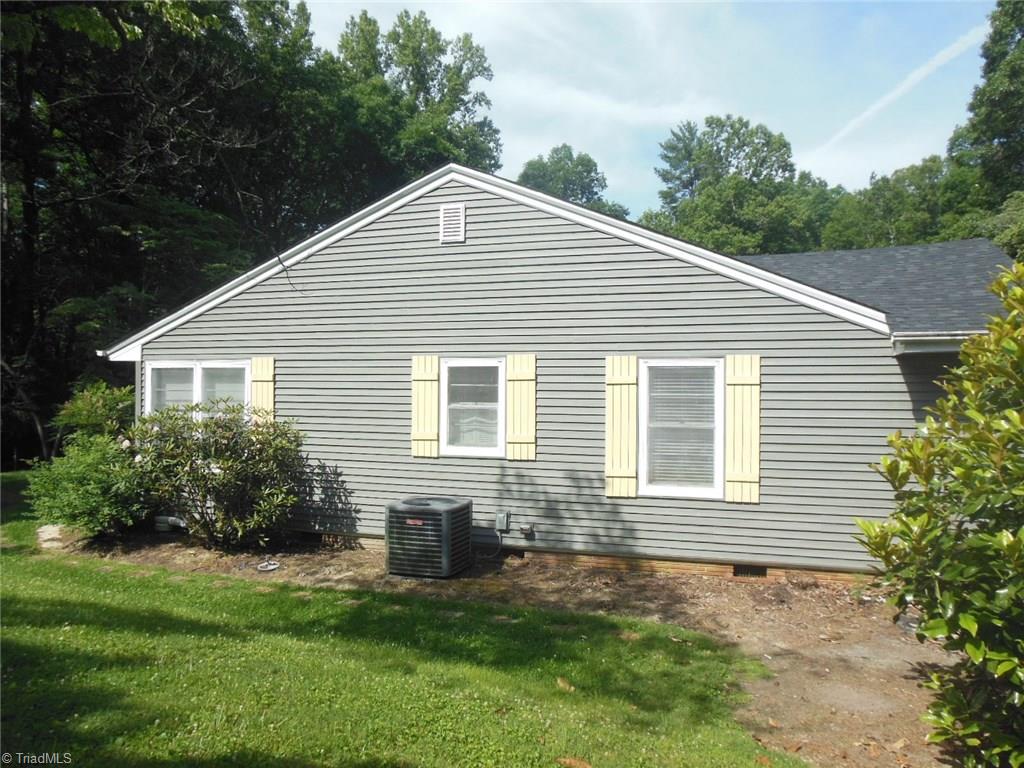 245 Country Club Road Mount Airy, NC 27030 - Photo 7 of 25 Left side of home.