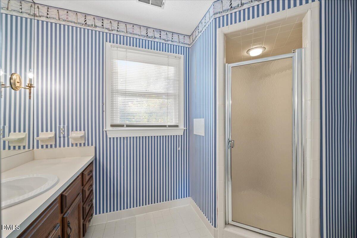 800 Temple Street Raleigh, NC 27609 - Photo 20 of 37 a view of a room that has a window in it