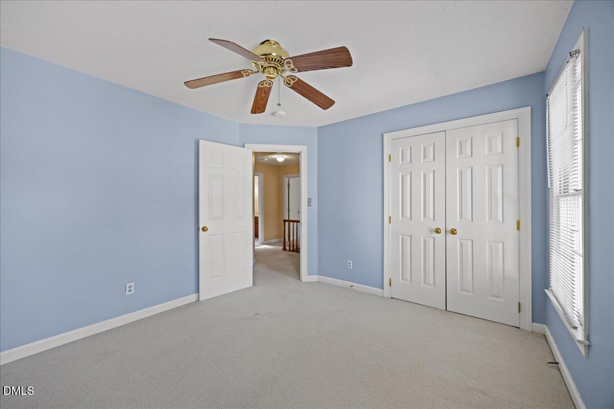 800 Temple Street Raleigh, NC 27609 - Photo 25 of 37 an empty room and chandelier fan