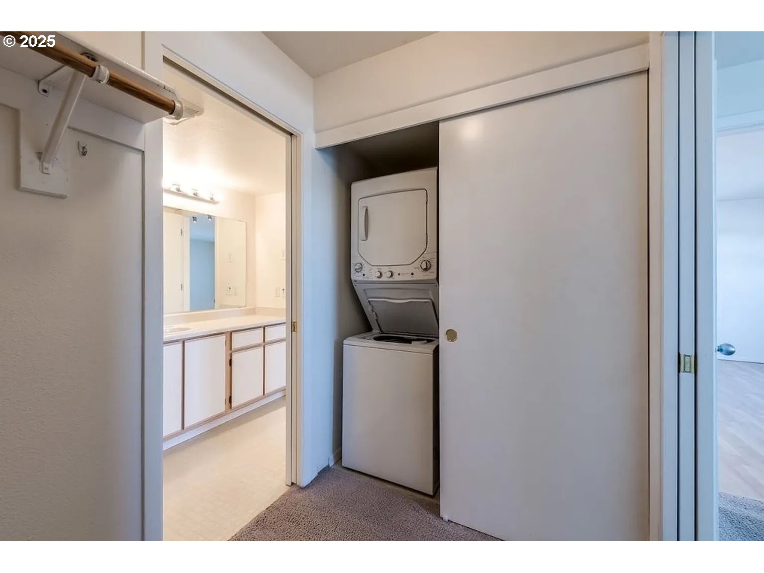 10345 Northeast Clackamas Street, Unit 15 Portland, OR 97220 - Photo 11 of 14 a utility room with dryer and washer