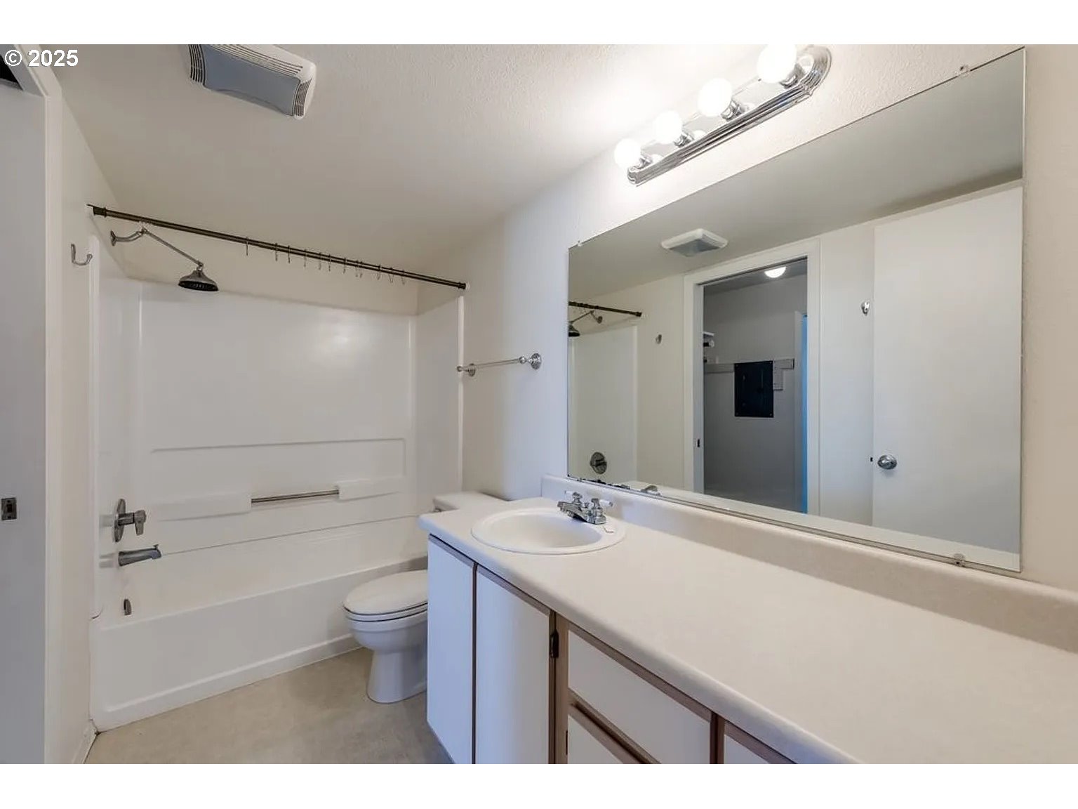 10345 Northeast Clackamas Street, Unit 15 Portland, OR 97220 - Photo 12 of 14 a bathroom with a sink a toilet and shower