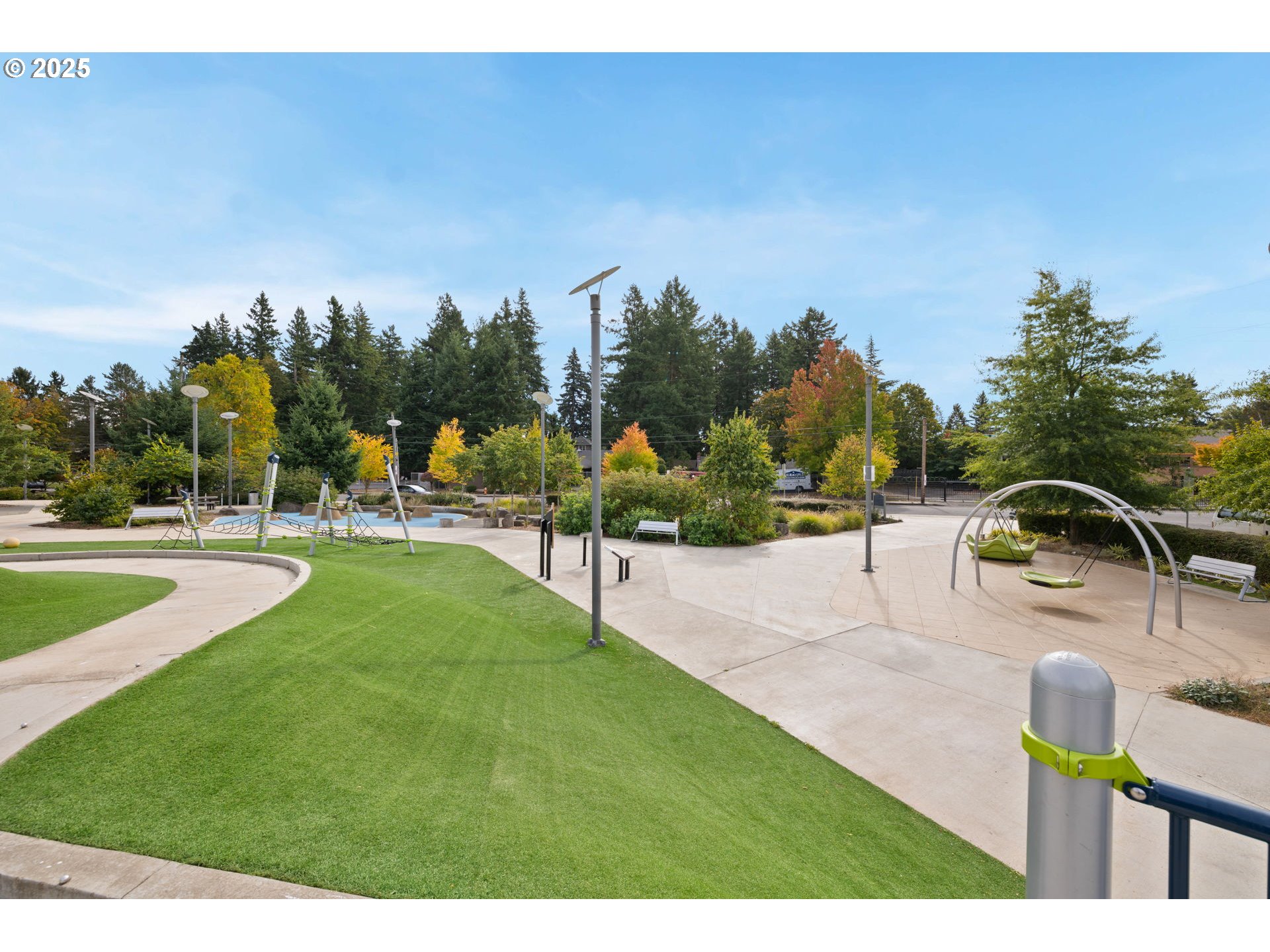 10345 Northeast Clackamas Street, Unit 15 Portland, OR 97220 - Photo 14 of 14 a view of a swimming pool with a yard