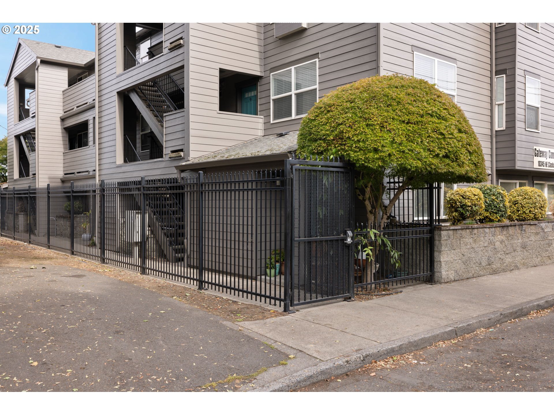 10345 Northeast Clackamas Street, Unit 15 Portland, OR 97220 - Photo 2 of 14 a house view with a outdoor space