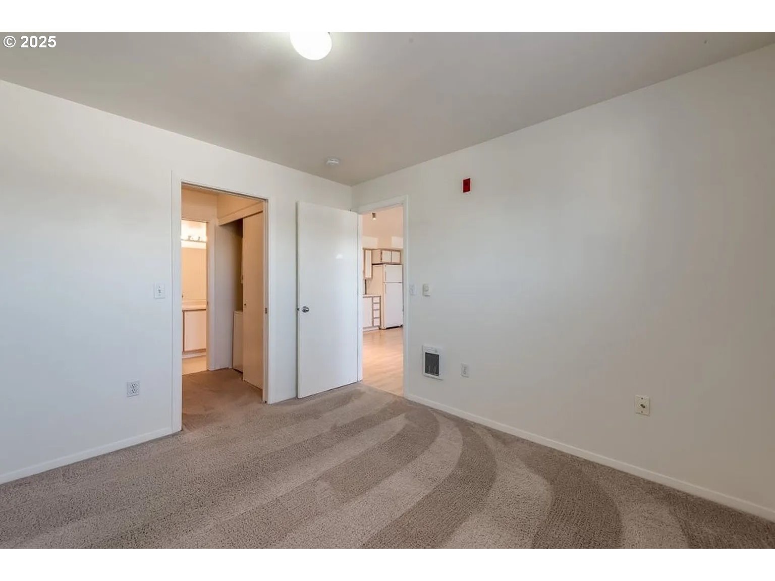 10345 Northeast Clackamas Street, Unit 15 Portland, OR 97220 - Photo 9 of 14 a view of an empty room